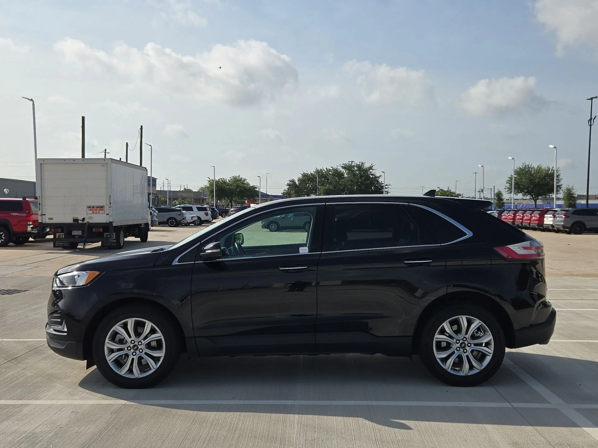 Used 2024 Black Metallic Ford Titanium image 6