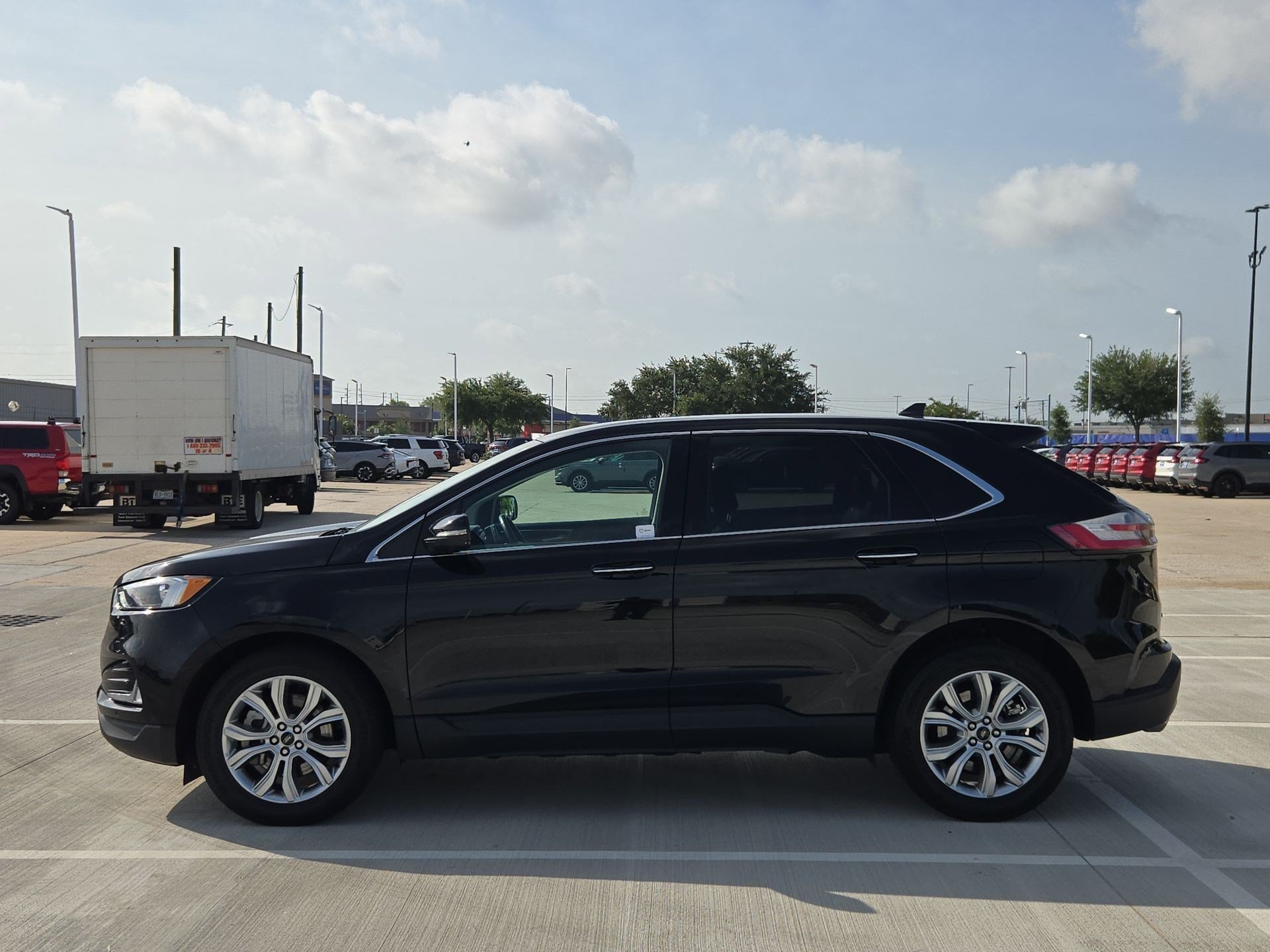 Used 2024 Black Metallic Ford Titanium image 6