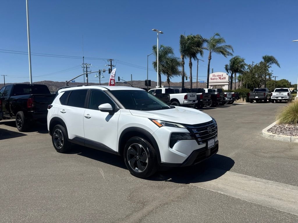 Used 2024 White Nissan SV image 1