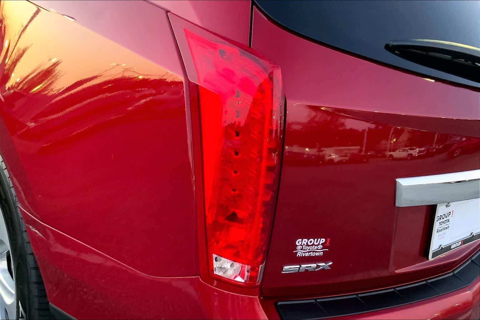 Used 2013 Crystal Red Tintcoat Cadillac Performance Collection image 27