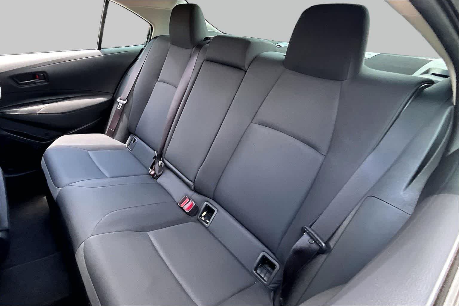 Used 2025 Midnight Black Metallic Toyota Hybrid LE image 19