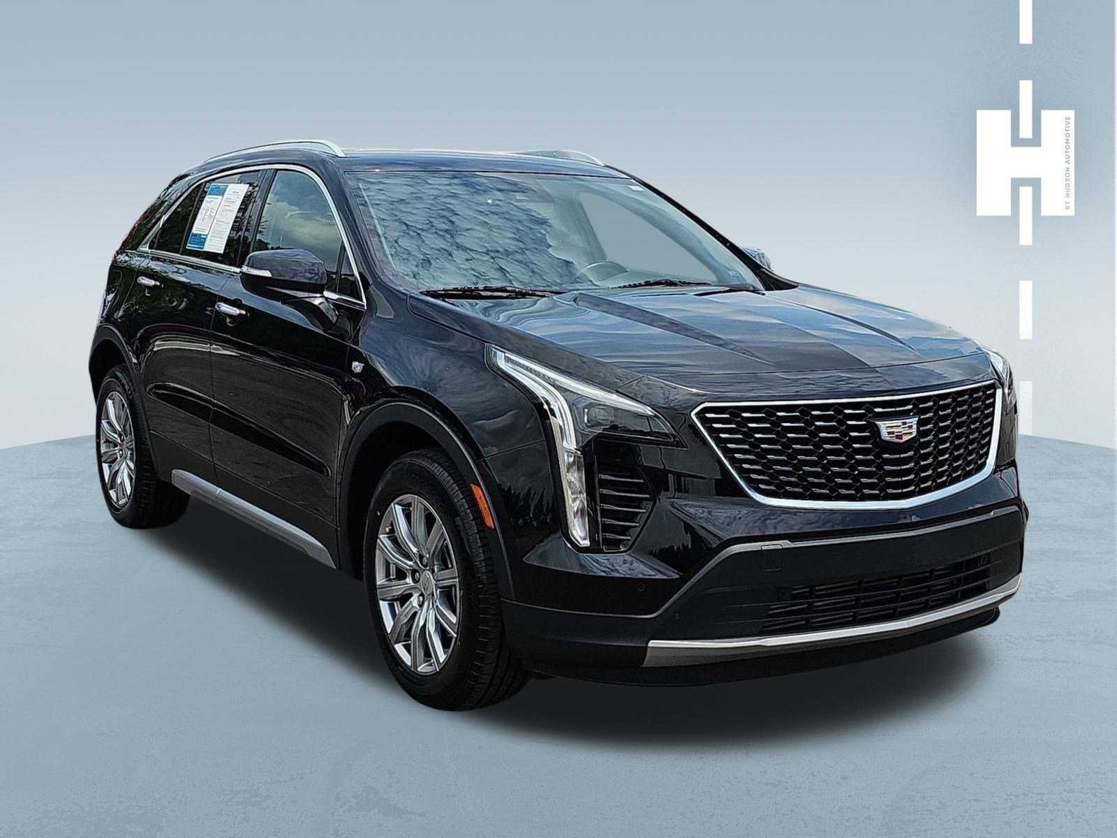 Used 2023 Stellar Black Metallic Cadillac FWD Premium Luxury image 1