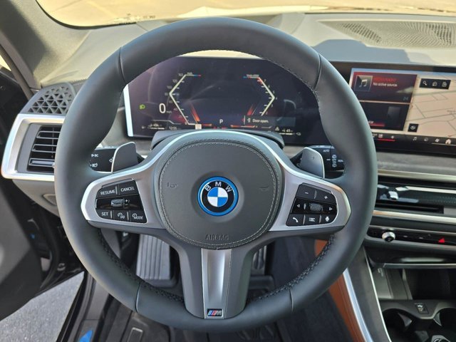 New 2026 Black Sapphire Metallic BMW xDrive50e image 17