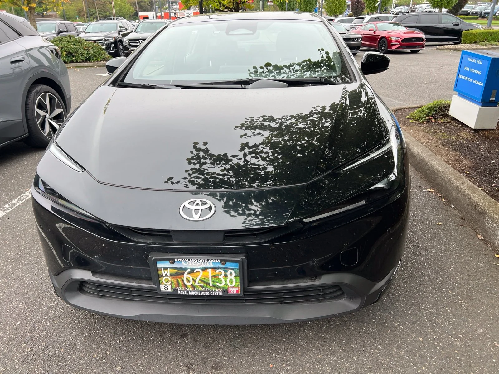 Used 2024 Midnight Black Metallic Toyota LE image 2