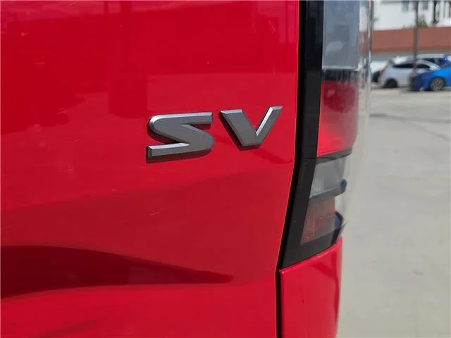 Used 2022 Red Alert Nissan SV (A9) 4x2 Crew Cab 5 ft. box 126 in. WB image 7