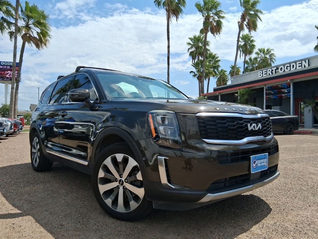 Used 2022 Green Kia EX image 1