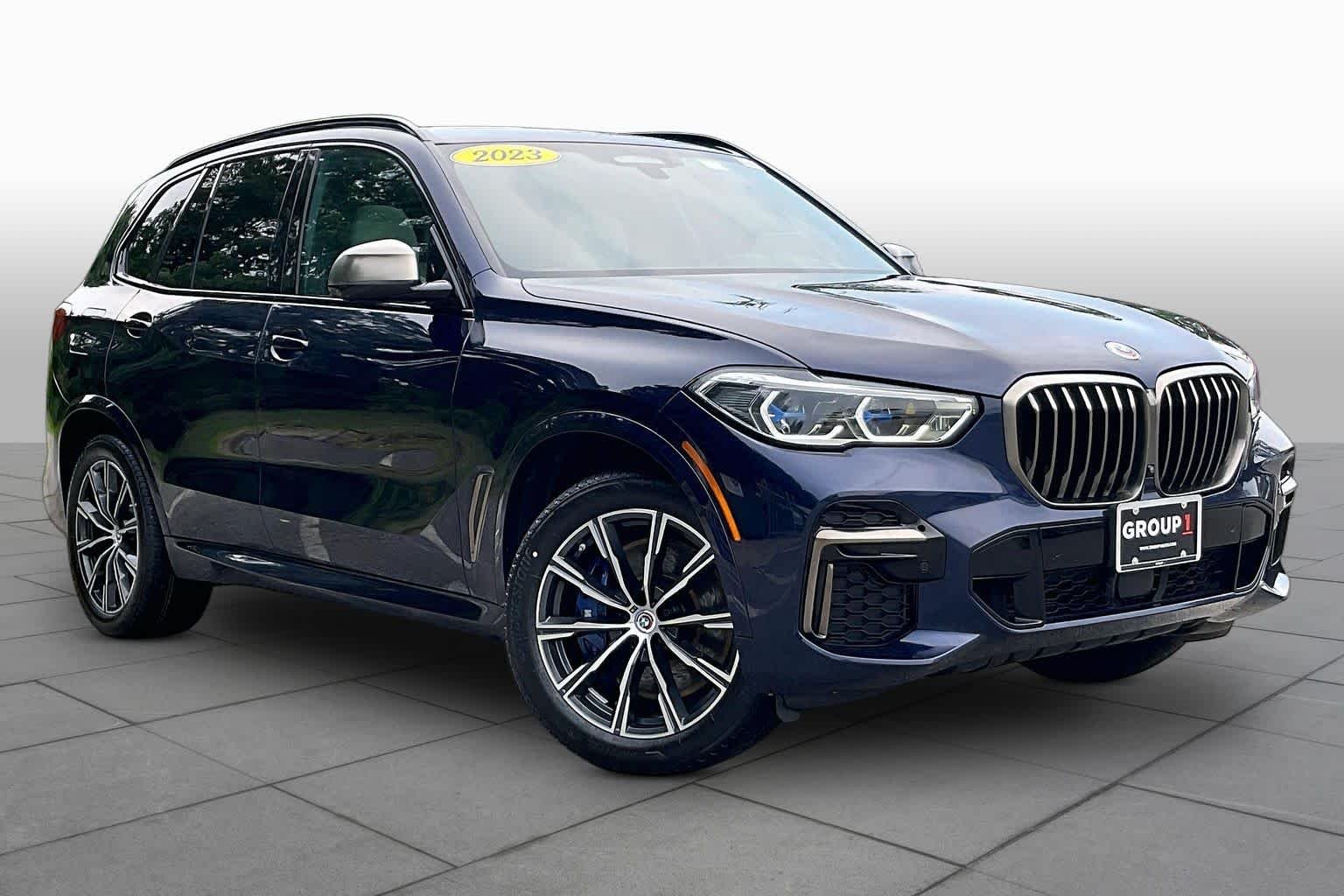 Used 2023 Tanzanite Blue II Metallic BMW M50i image 2