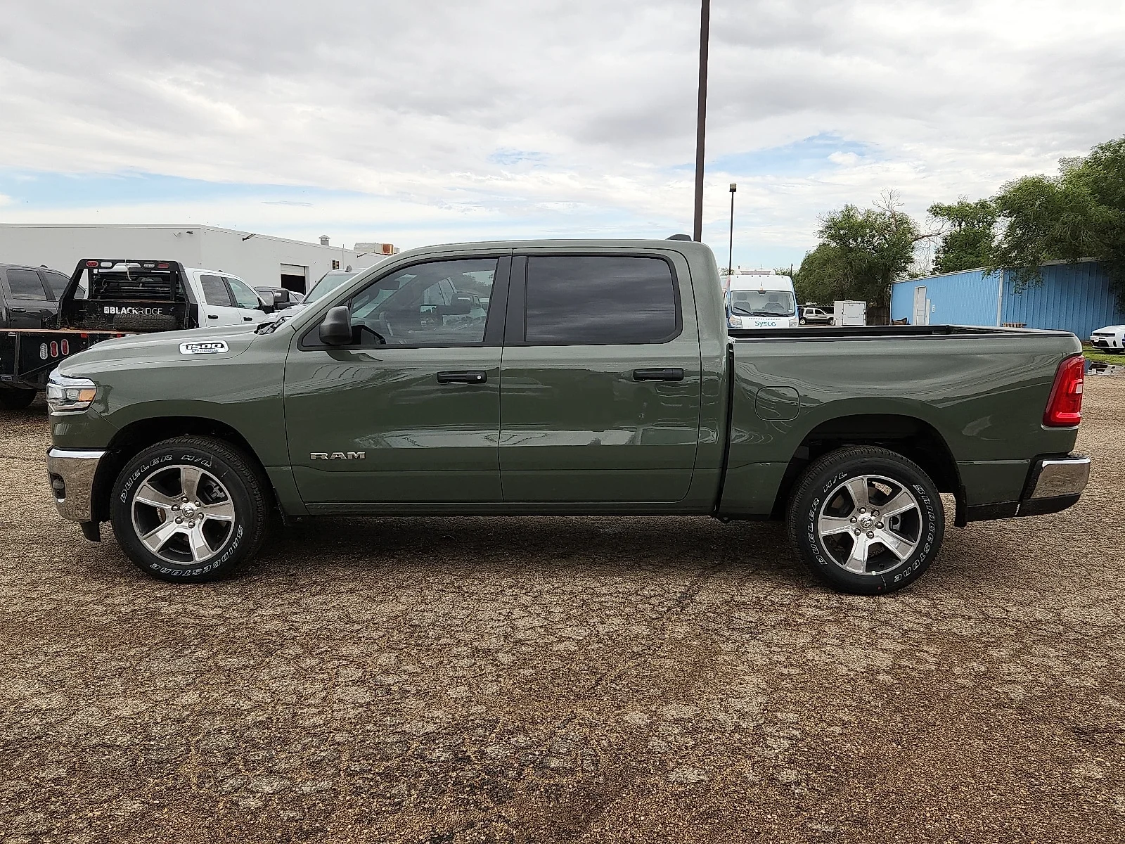 New 2026 Gray Ram TRADESMAN CREW CAB 4X2 5