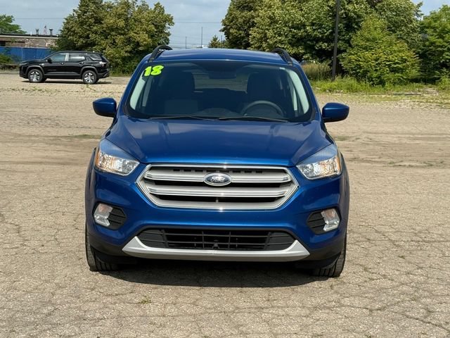 Used 2018 Ford Escape SE with VIN 1FMCU0GD8JUD35717 for sale in Woodhaven, MI