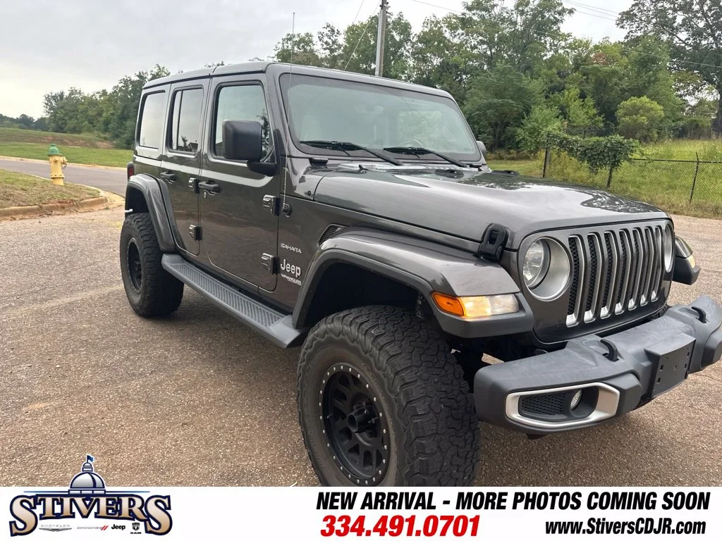 Used 2018 Gray Jeep Unlimited Sahara image 1