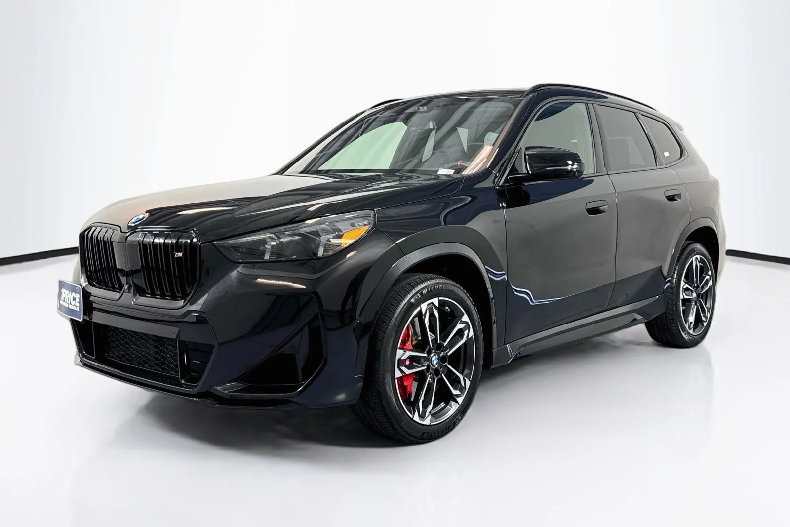 Used 2024 Black Sapphire Metallic BMW M35i image 1