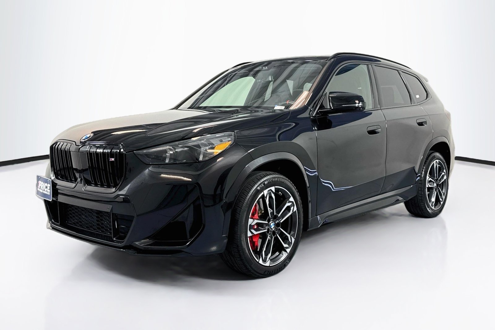 Used 2024 Black Sapphire Metallic BMW M35i image 1