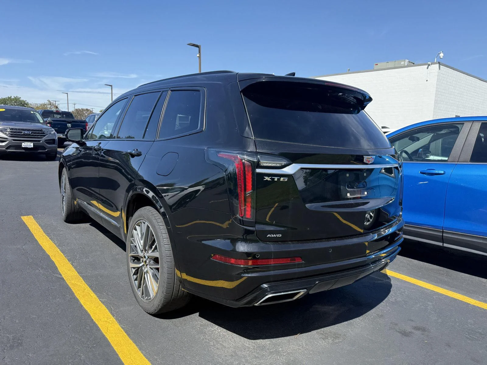 Used 2025 Stellar Black Metallic Cadillac Sport image 4