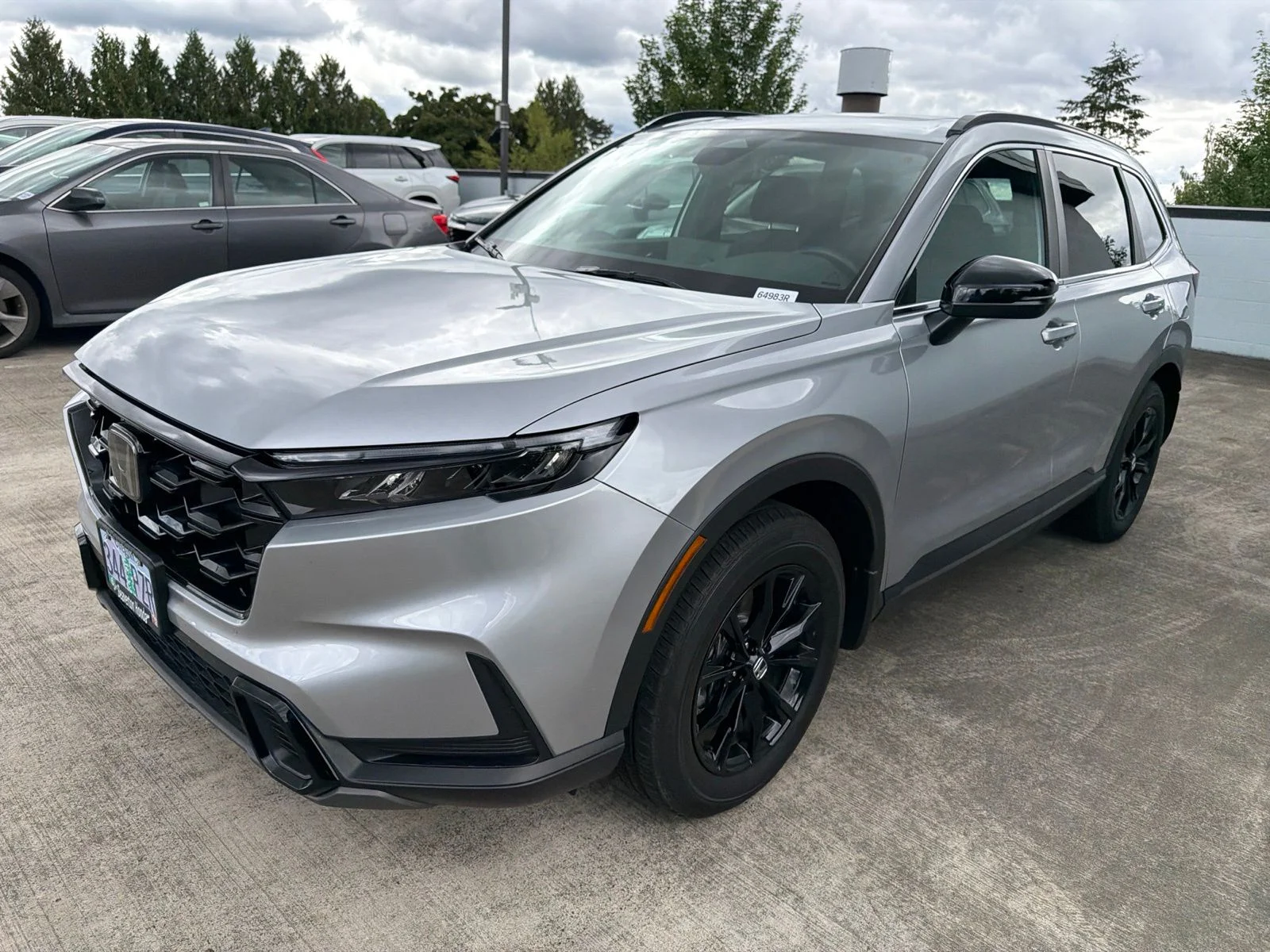 Used 2025 Solar Silver Metallic Honda Sport image 1
