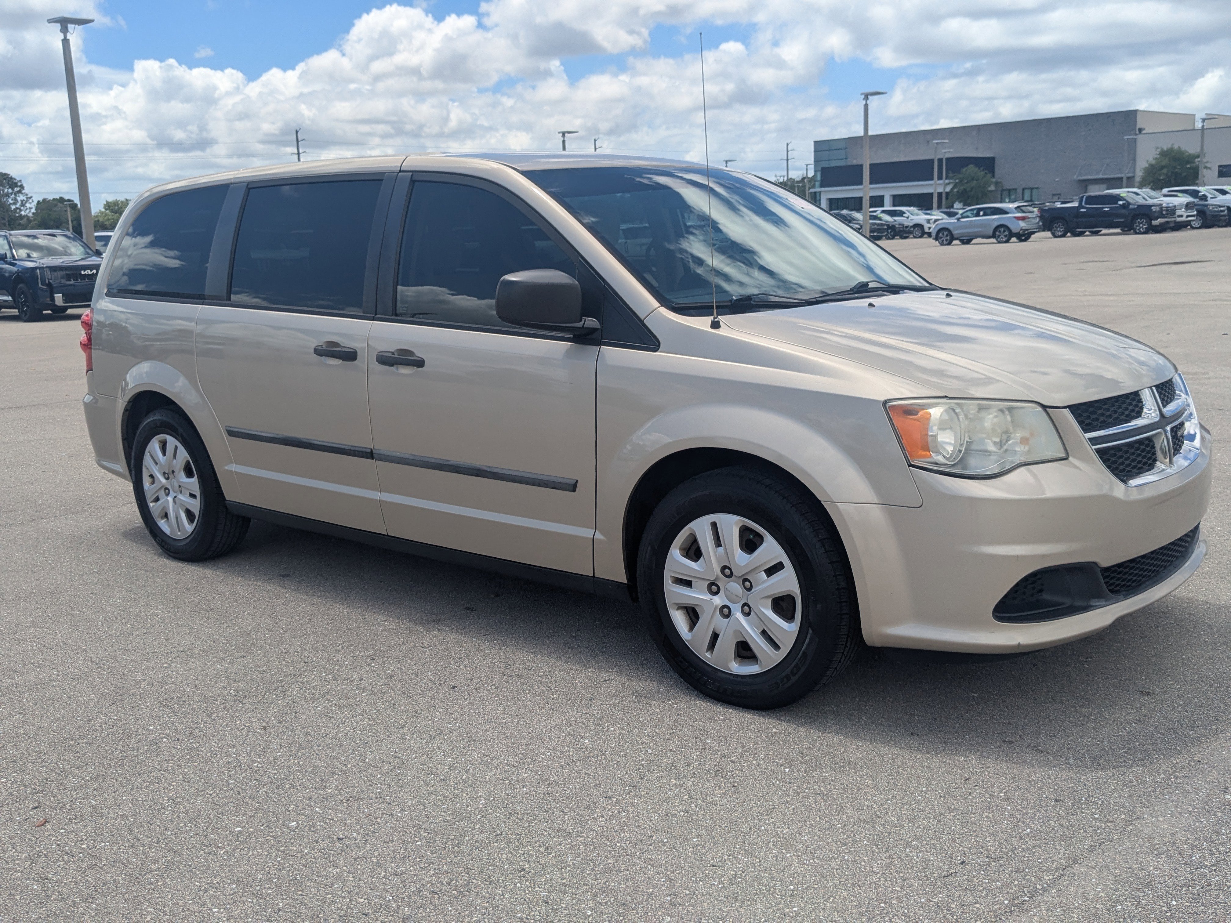 Used 2014 Dodge Grand Caravan American Value Package with VIN 2C4RDGBG5ER193550 for sale in Port Charlotte, FL