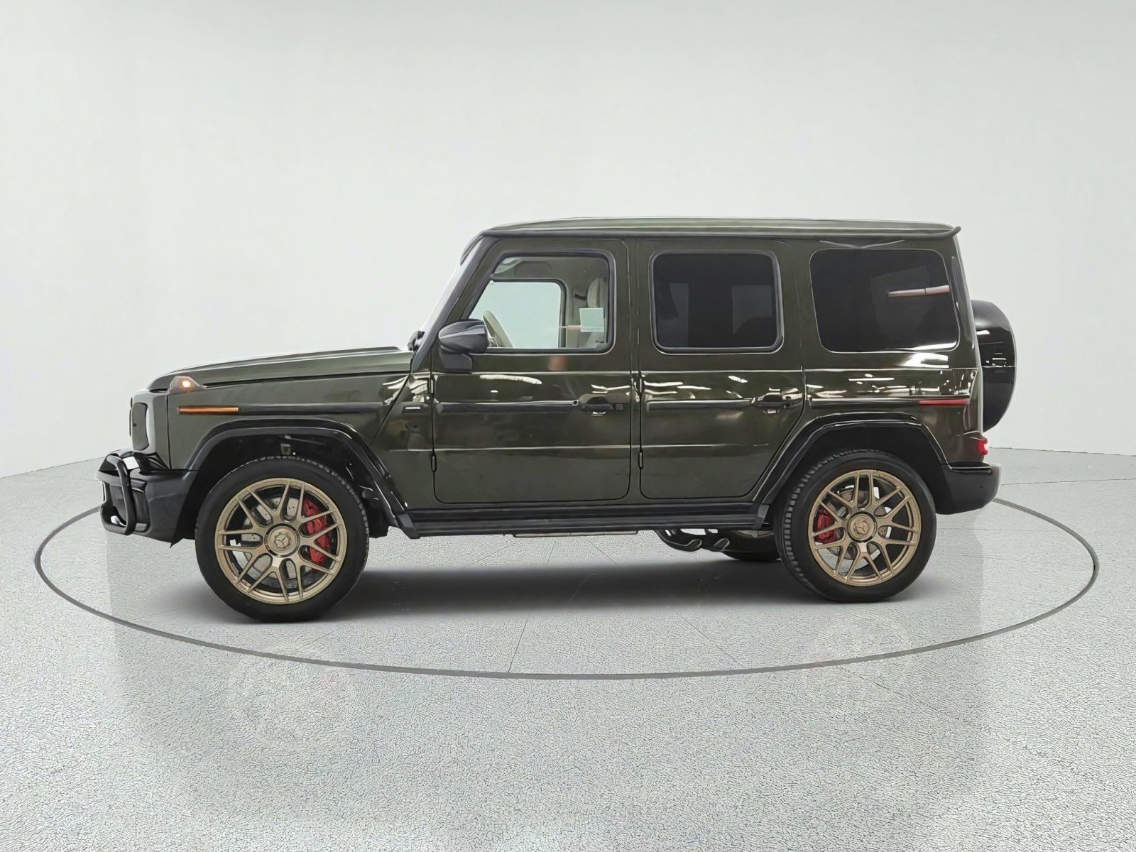 New 2027 MANUFAKTUR Olive Metallic Mercedes-Benz AMG® G 63 SUV image 8