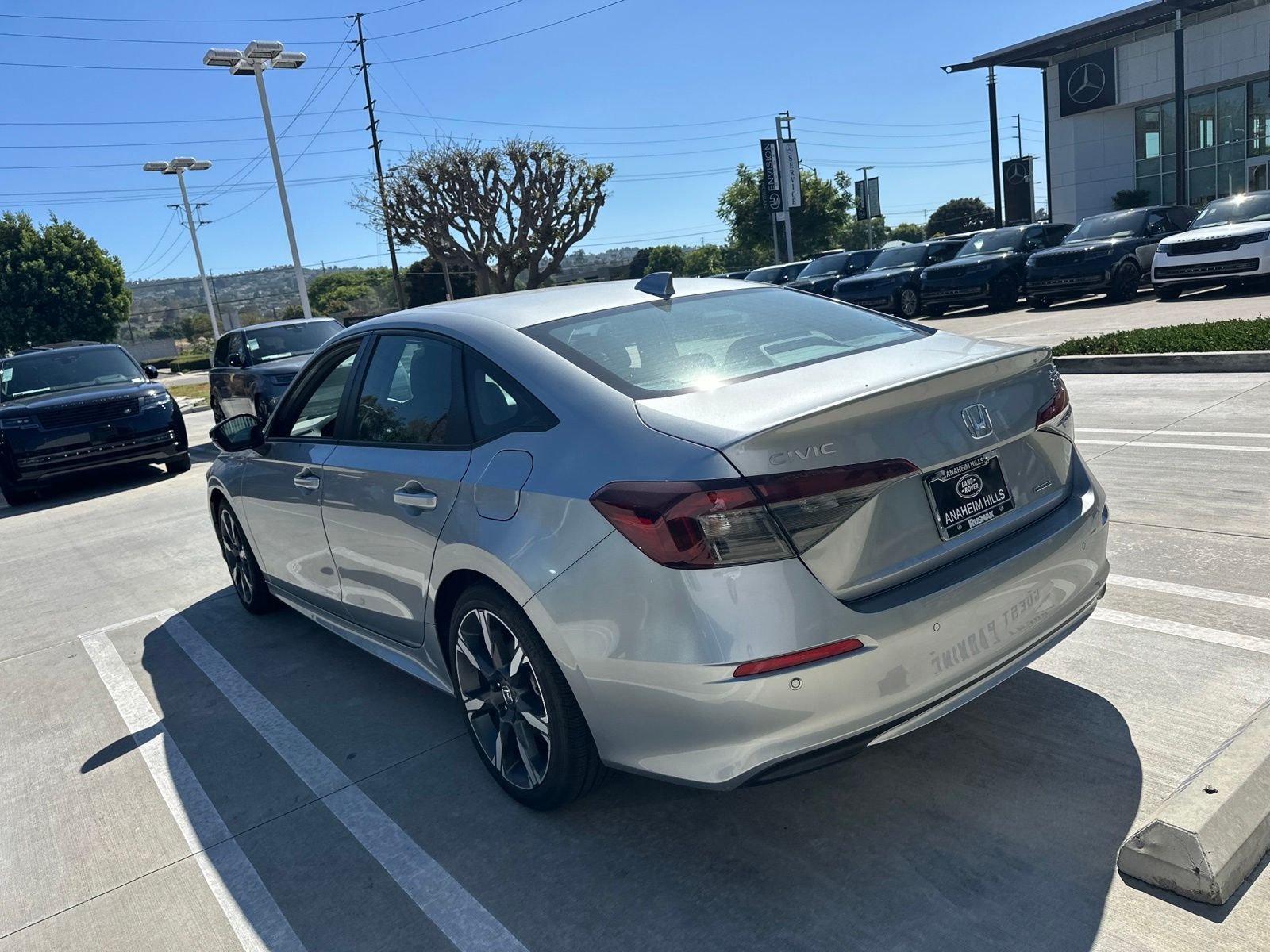 Used 2025 Solar Silver Metallic Honda Sport image 4