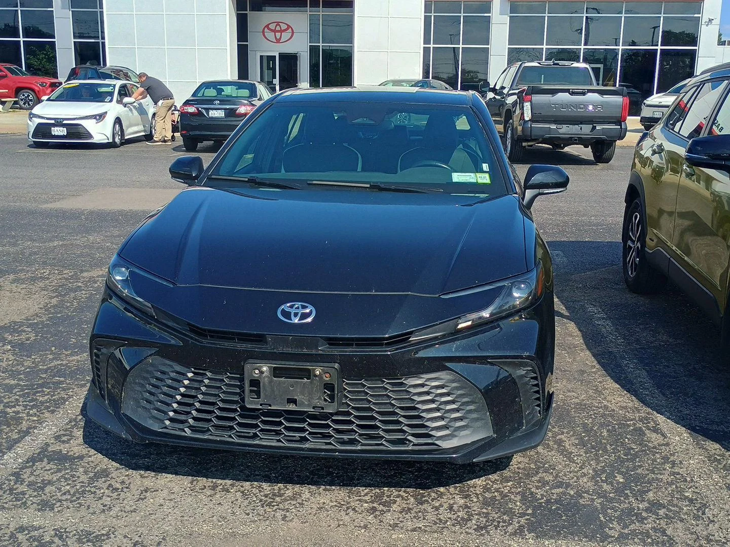 Used 2025 Midnight Black Metallic Toyota SE image 2