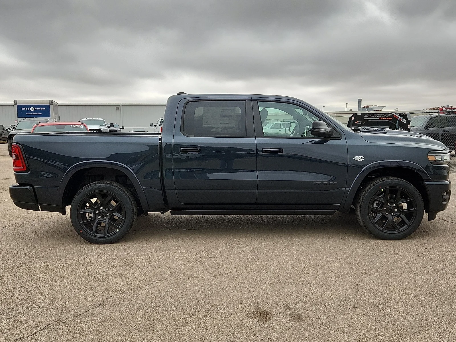 New 2026 Forged Blue Metallic  Paint Ram LARAMIE CREW CAB 4X4 5