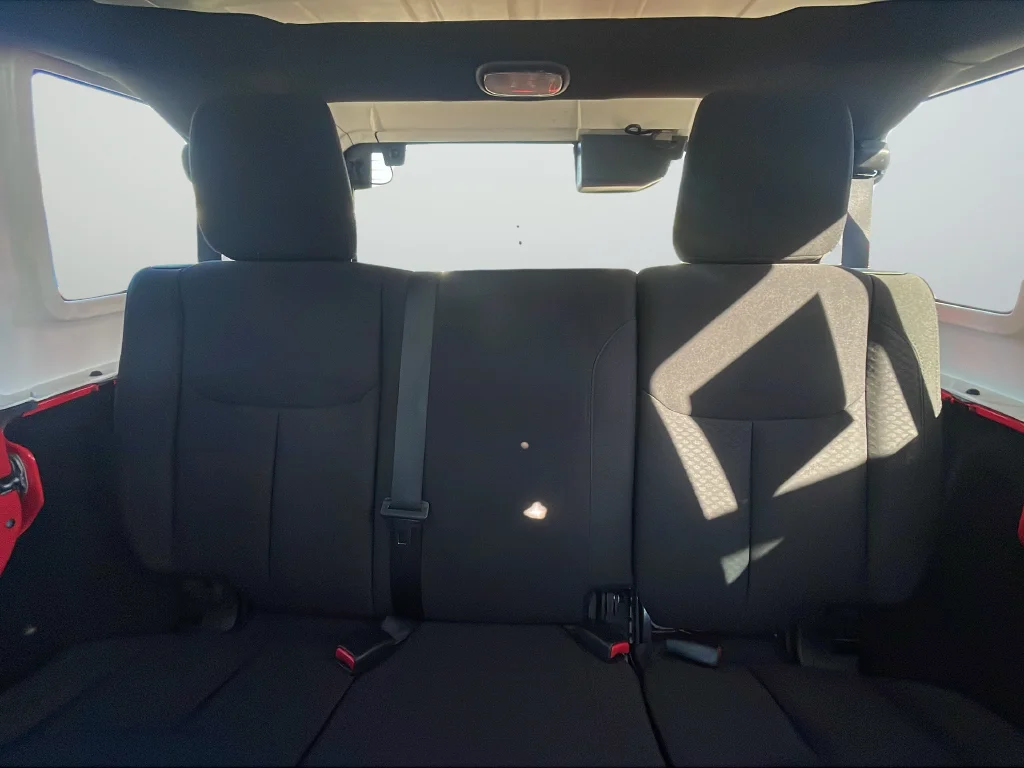 Used 2013 Red Jeep Unlimited Sport image 29