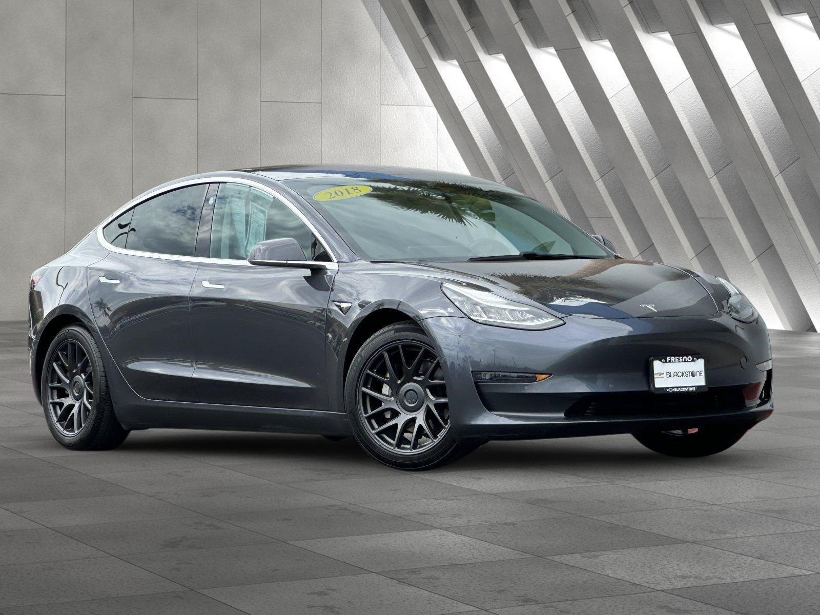 Used 2018 Tesla Model 3 Long Range with VIN 5YJ3E1EA3JF053011 for sale in Fresno, CA