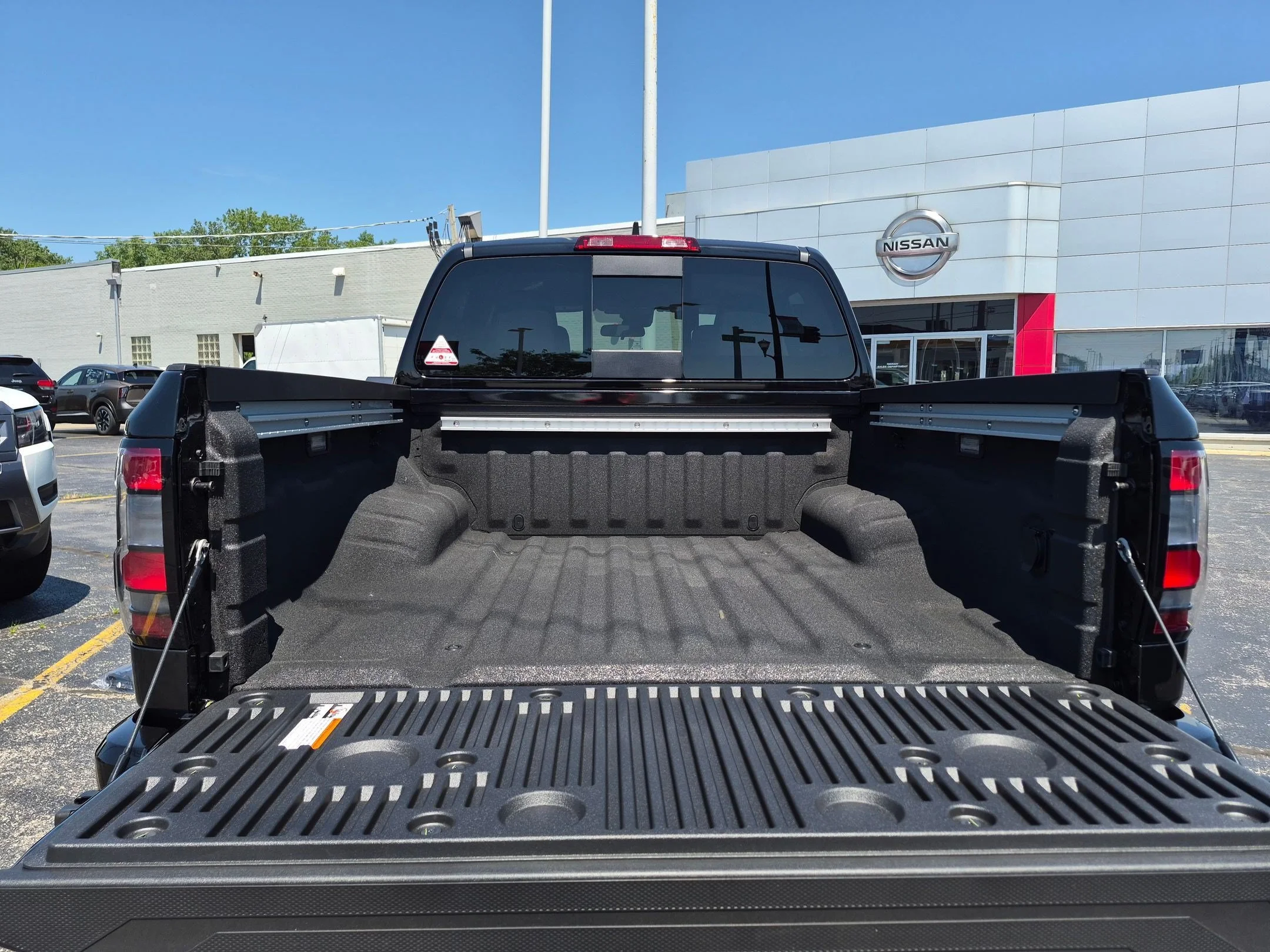 New 2026 Super Black Nissan Crew Cab SV image 24