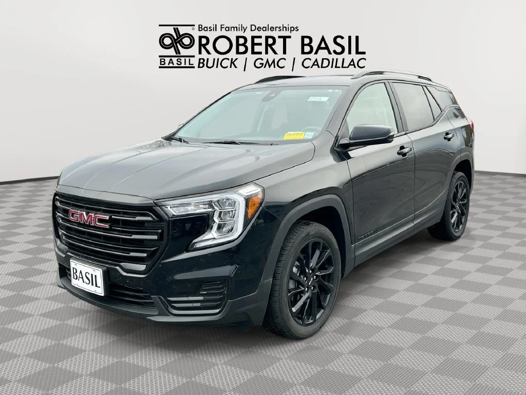Used 2024 Ebony Twilight Metallic GMC SLE image 1