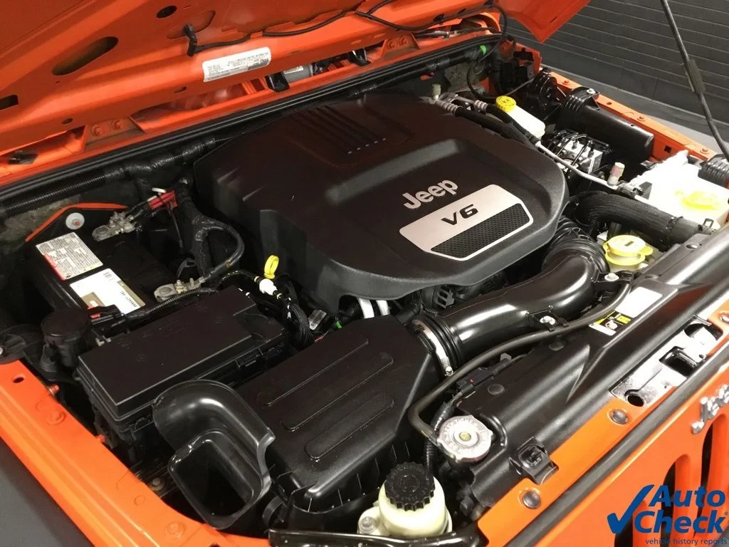 Used 2015 Orange Jeep Unlimited Sport image 43