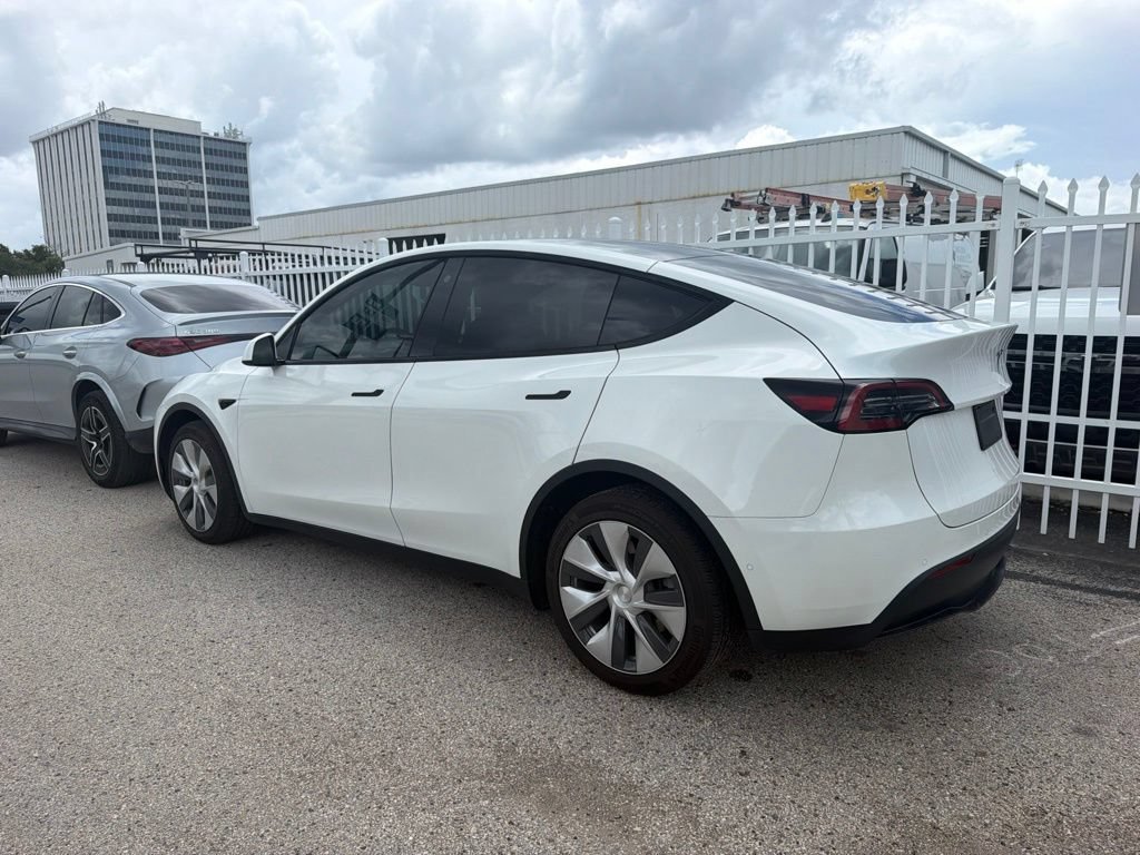 Used 2021 Tesla Model Y Long Range with VIN 5YJYGDEE3MF299775 for sale in Tampa, FL