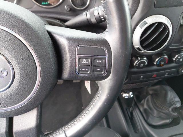 Used 2016 Black Clearcoat Jeep Sahara image 12