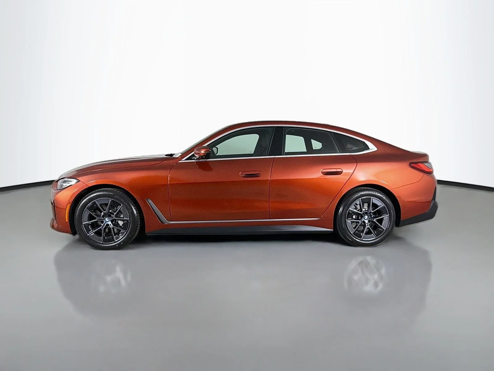 Certified Used 2024 Sunset Orange Metallic BMW eDrive35 image 4