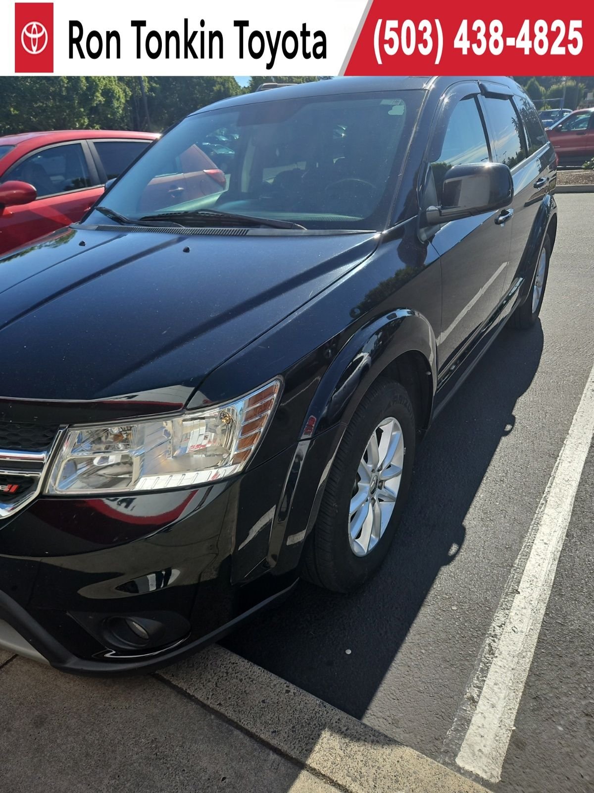 Used 2016 Pitch Black Clearcoat Dodge SXT image 1