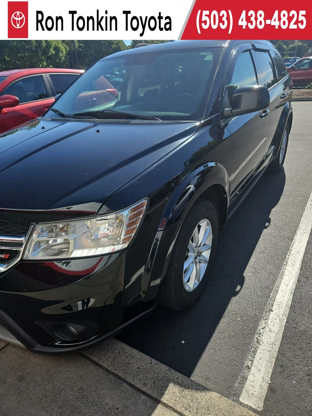Used 2016 Black Dodge SXT image 1