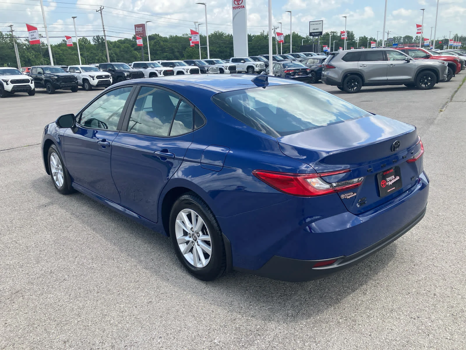Used 2025 Reservoir Blue Toyota LE image 5