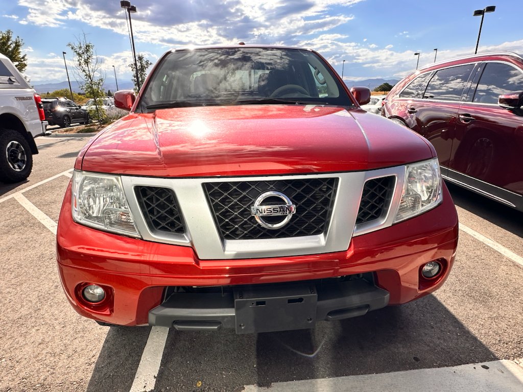 Used 2016 Lava Red Nissan PRO-4X image 1
