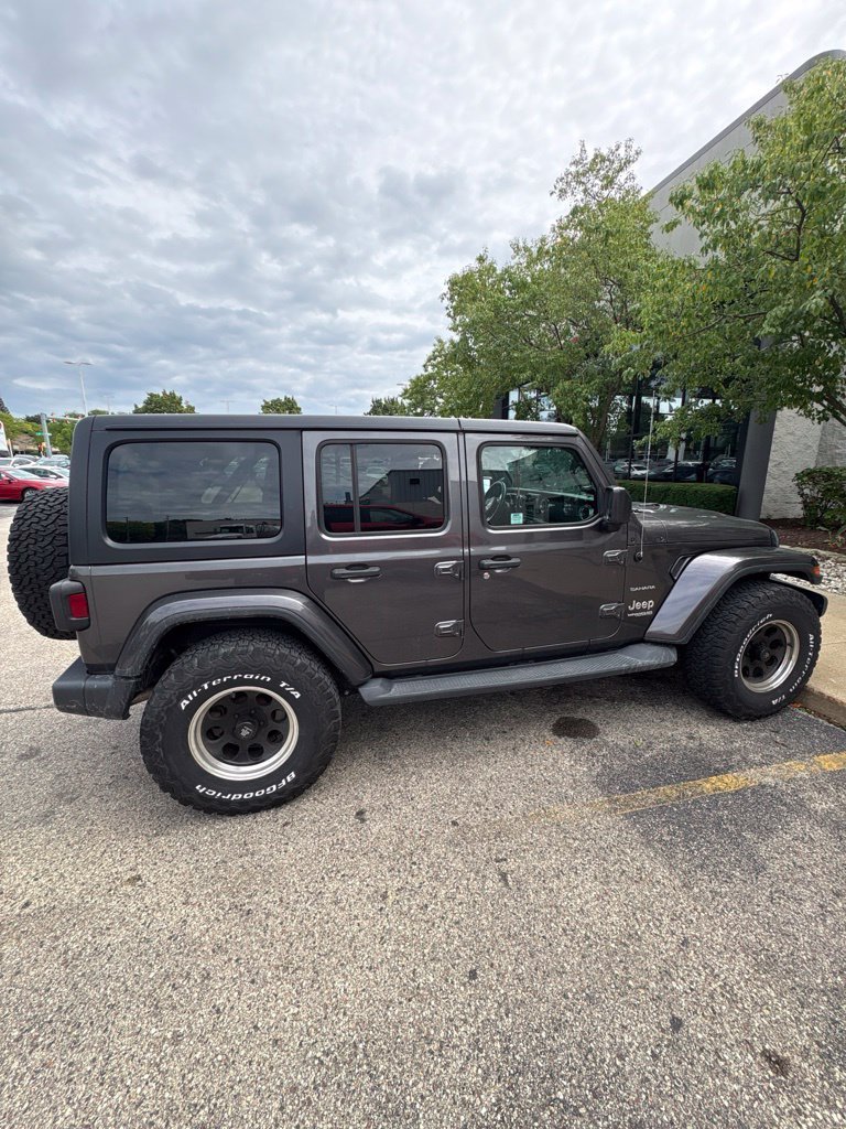 Used 2018 Crystal Metallic Jeep Unlimited Sahara image 1