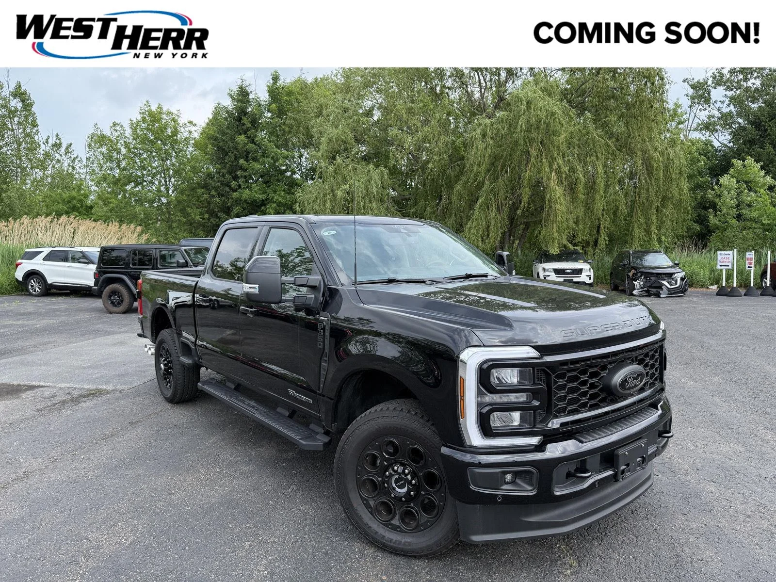 Used 2026 Agate Black Metallic Ford LARIAT image 1