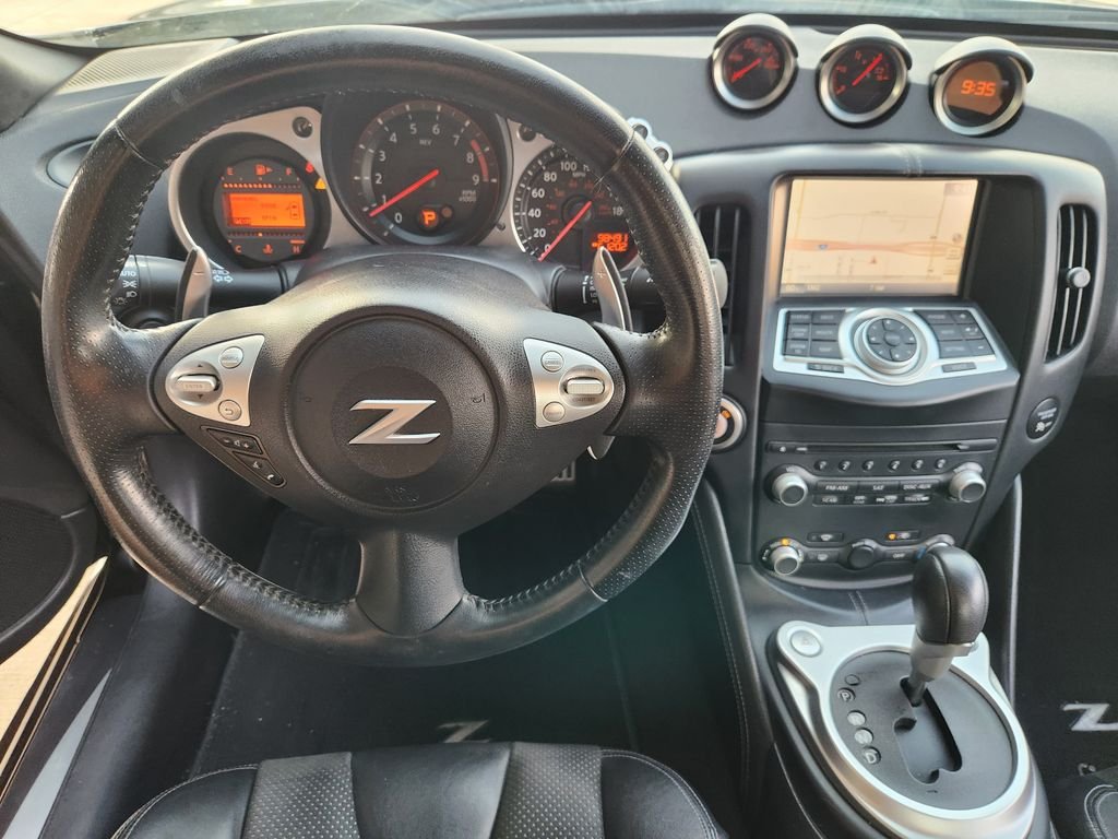 Used 2016 Black Cherry Nissan Touring image 30
