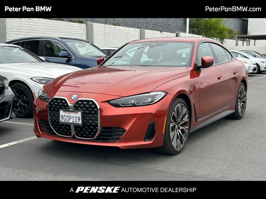 Certified Used 2023 Sunset Orange Metallic BMW 430i Gran Coupe image 1