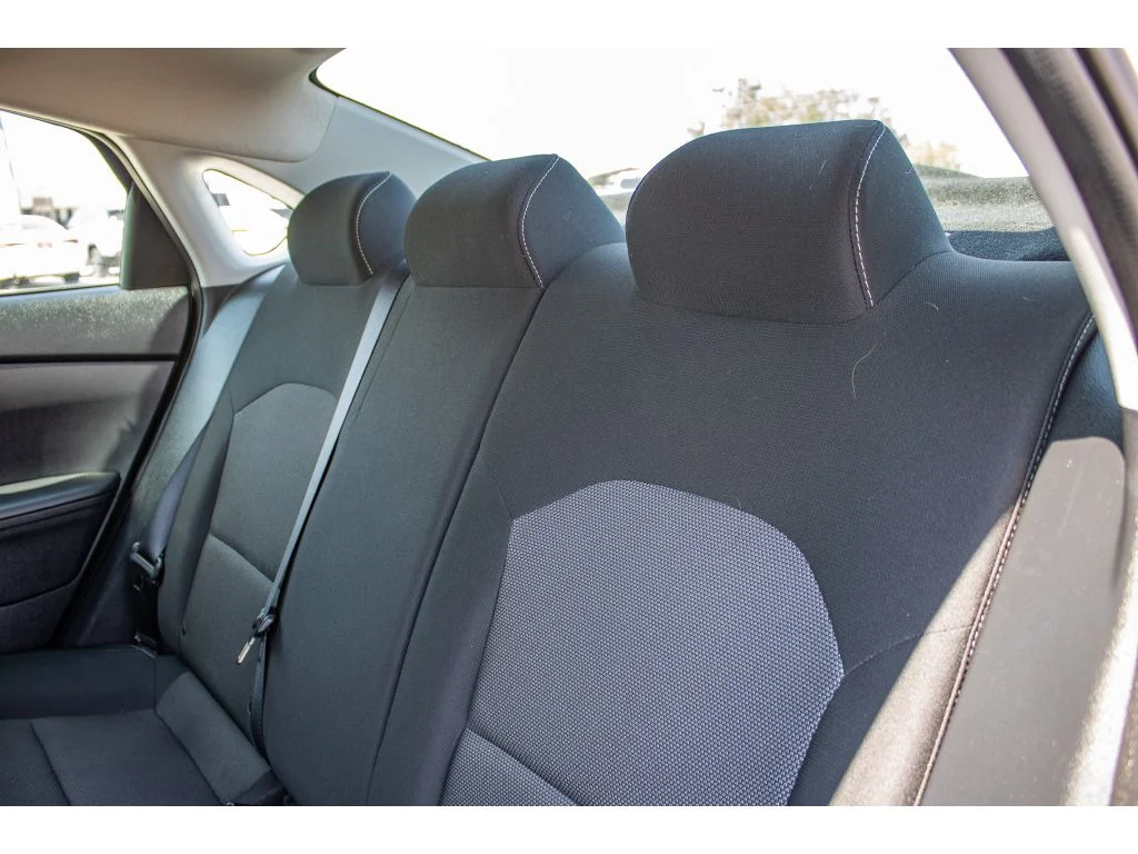 Used 2024 Snow White Pearl Kia LXS image 18