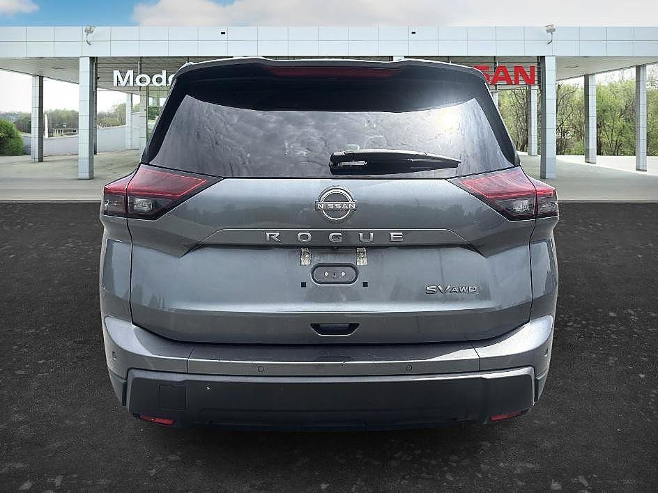 Used 2024 Gun Metallic Nissan SV image 4