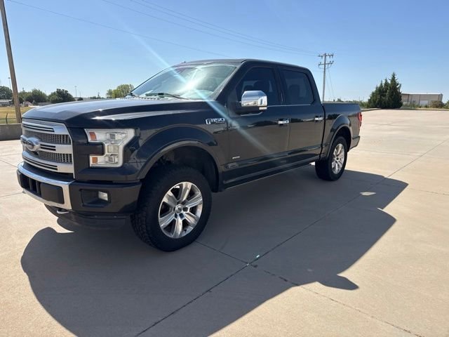 Used 2015 Tuxedo Black Metallic Ford Platinum image 1