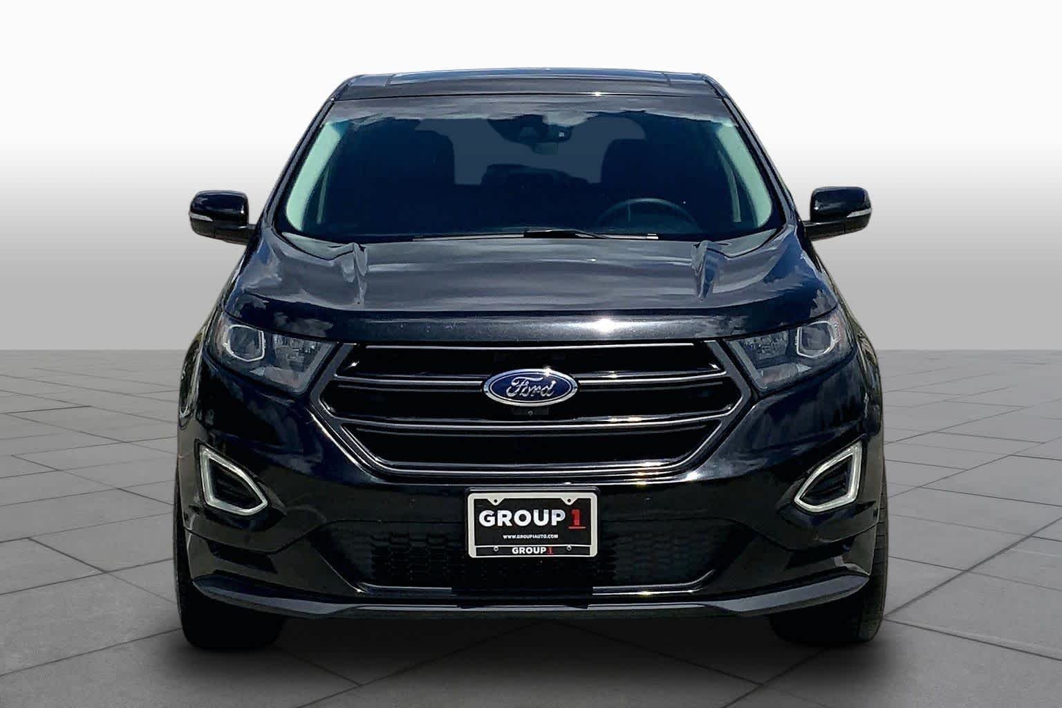 Used 2015 Tuxedo Black Ford Sport image 4