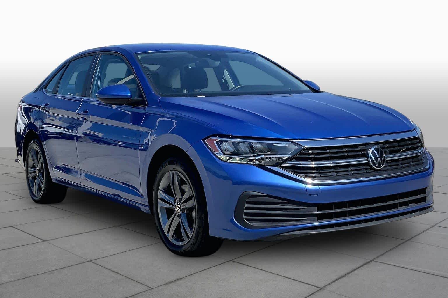 Used 2024 Rising Blue Metallic Volkswagen SE image 3