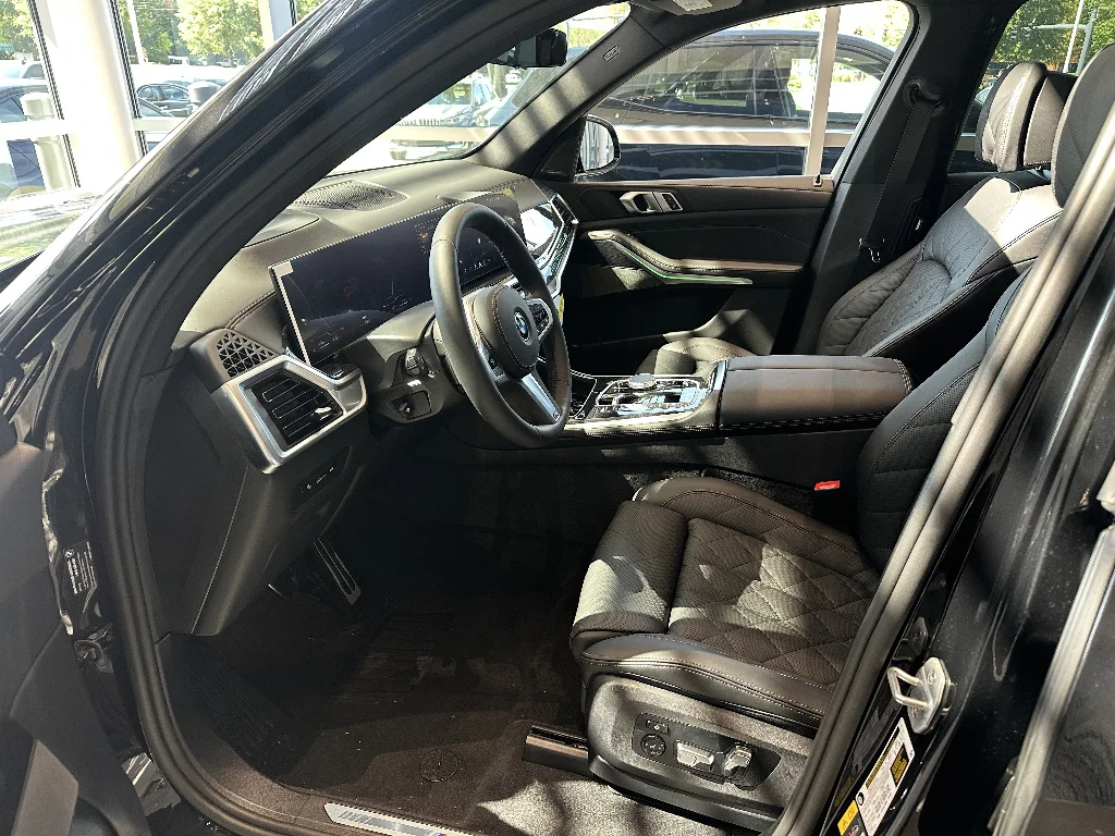 New 2026 Black Sapphire Metallic BMW xDrive50e image 12
