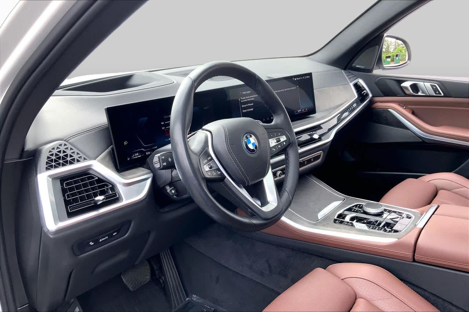 Used 2024 Mineral White Metallic BMW xDrive50e image 17