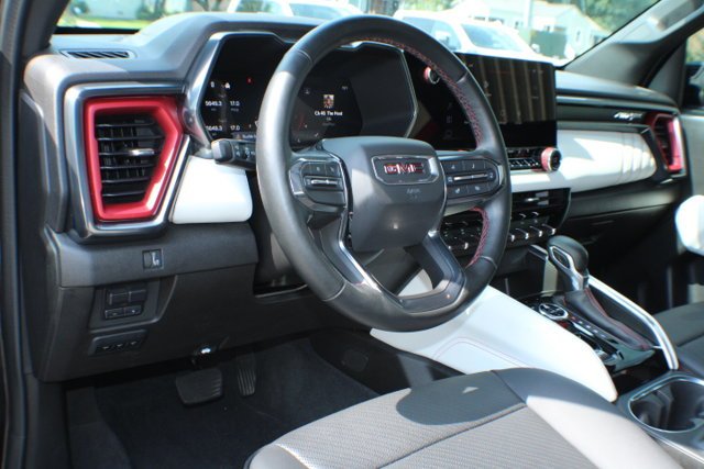 Used 2024 Onyx Black GMC 4WD AT4X image 8