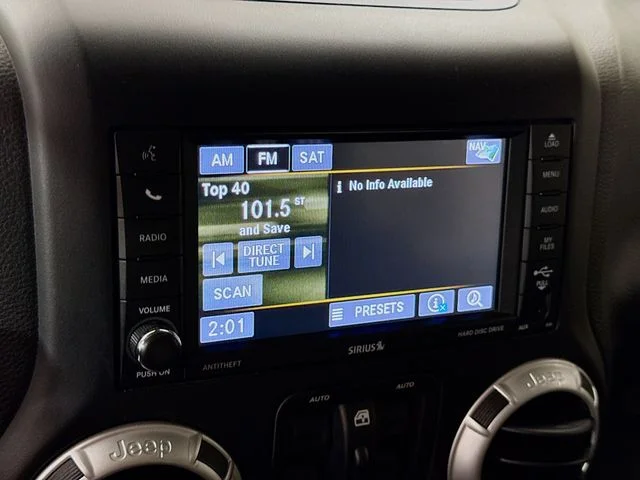 Used 2018 White Jeep Unlimited Sahara image 16