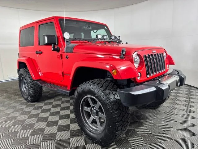 Used 2015 Firecracker Red Clear Coat Jeep Sahara image 1