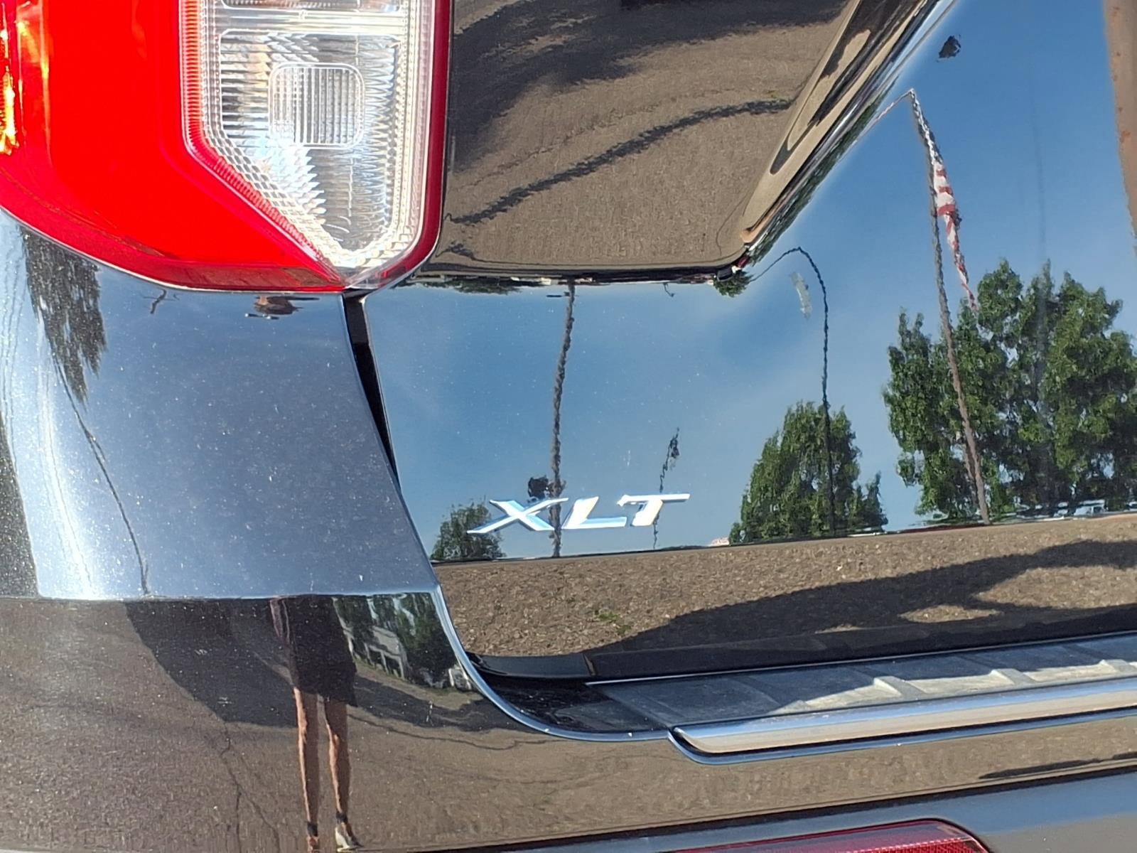 Certified Used 2024 Agate Black Metallic Ford XLT image 26